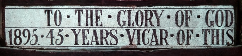 Inscription at bottom of left-hand light