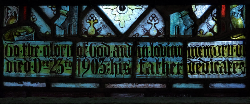 Inscription at base of left-hand light
