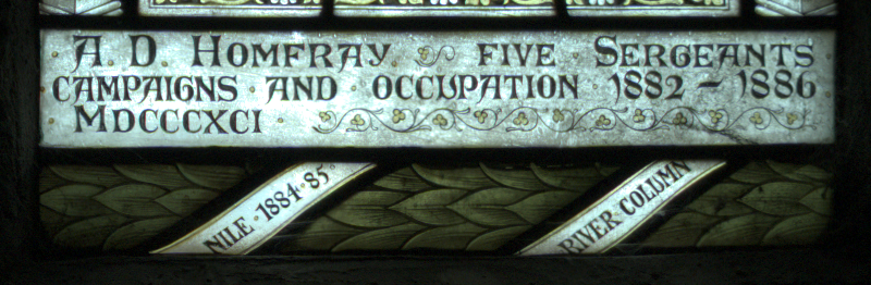 Inscription at the base of d