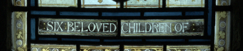 Inscription at base of b