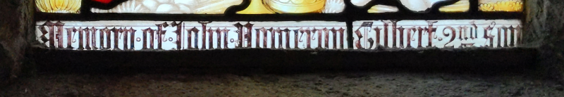 Inscription at base of b