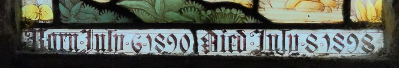 Inscription at base of d