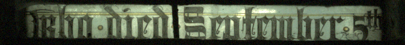 Inscription at base of c