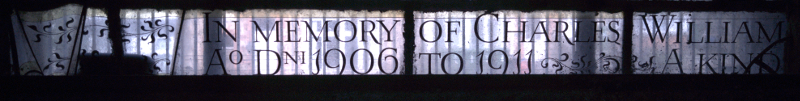 Inscription at bottom of third light